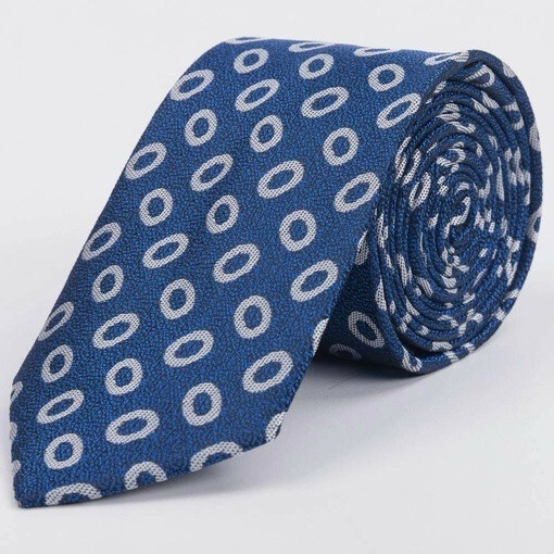 Кликните для увеличения изображения Прокат текстурированного галстука синего цвета с крупным белым кольцевым узором для мужских костюмов